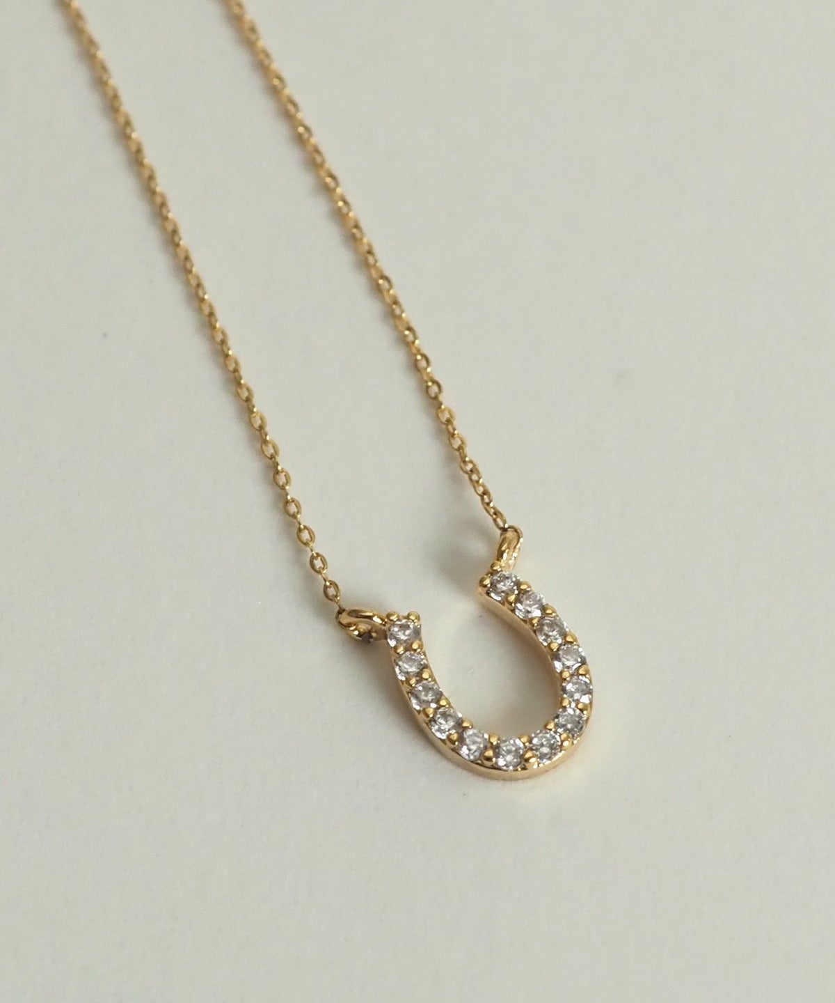 パヴェホースシュープチペンダント【MUK petite charme】