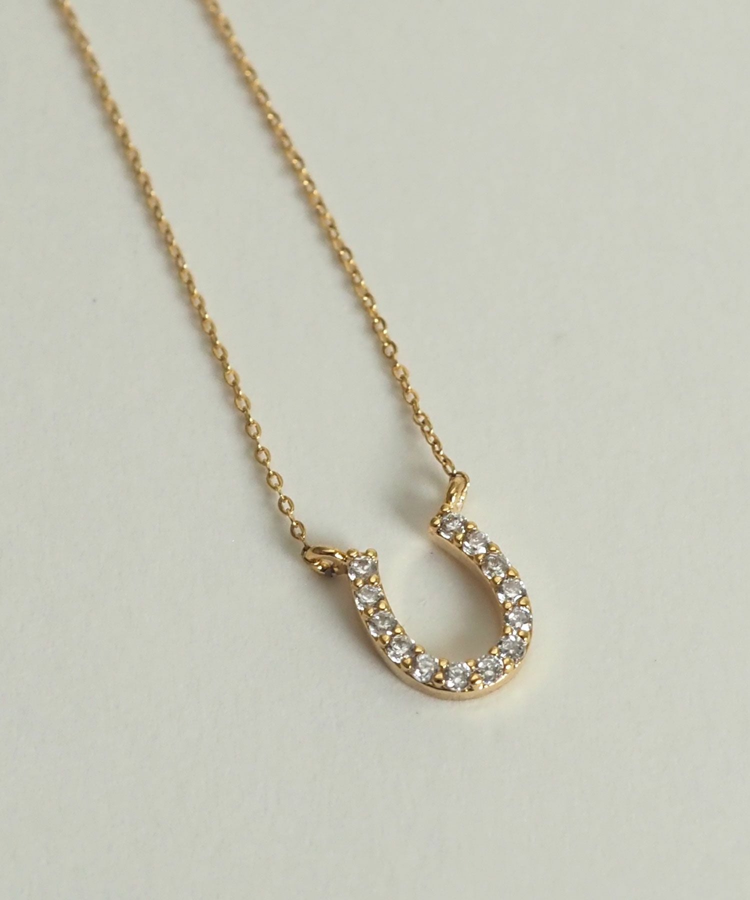 パヴェホースシュープチペンダント【MUK petite charme】