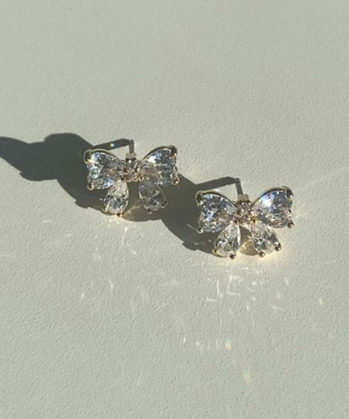 キュービックプチリボンチタンポストピアス【Dahlia】