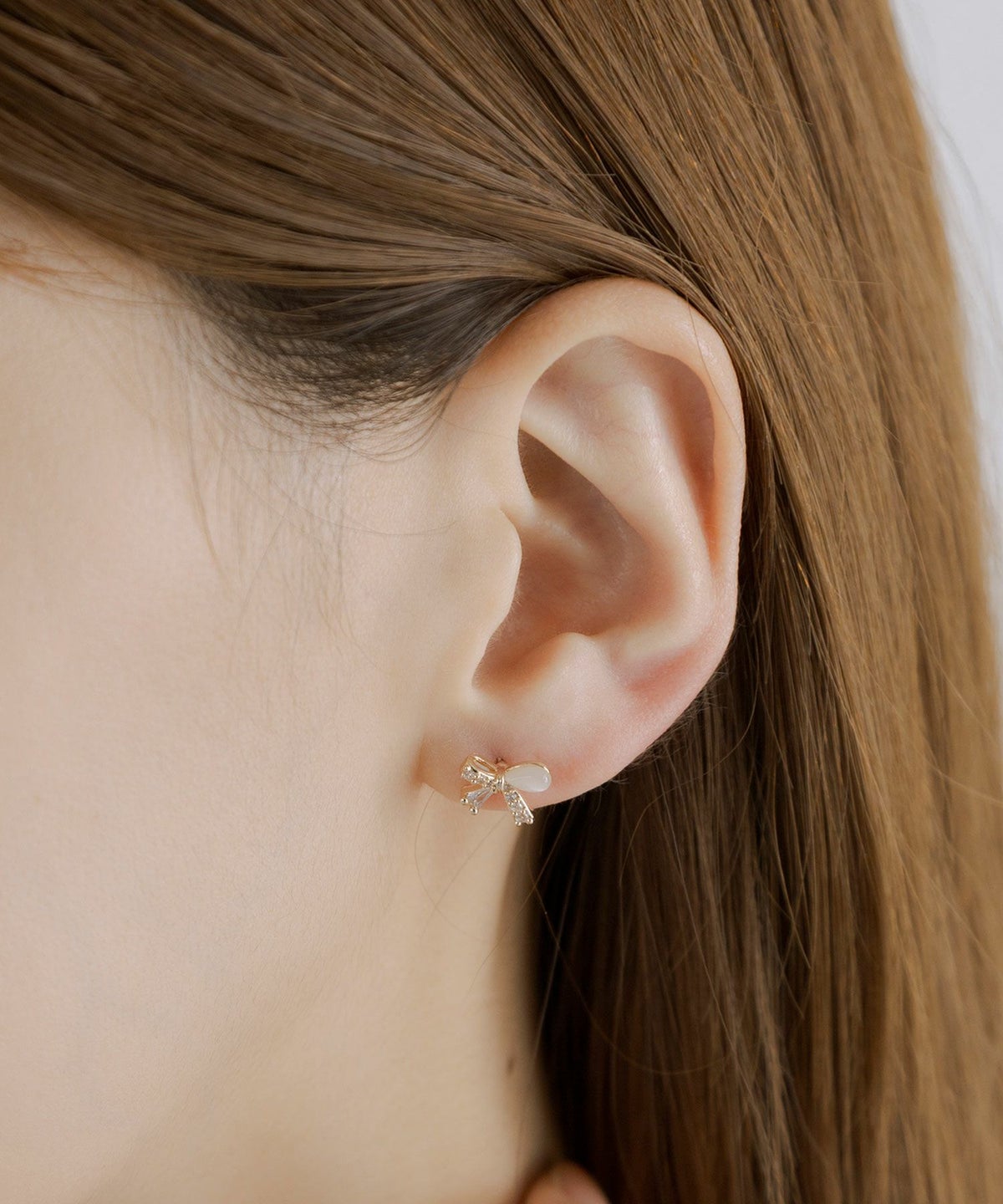 アシンメトリーリボンキャッツアイチタンポストピアス