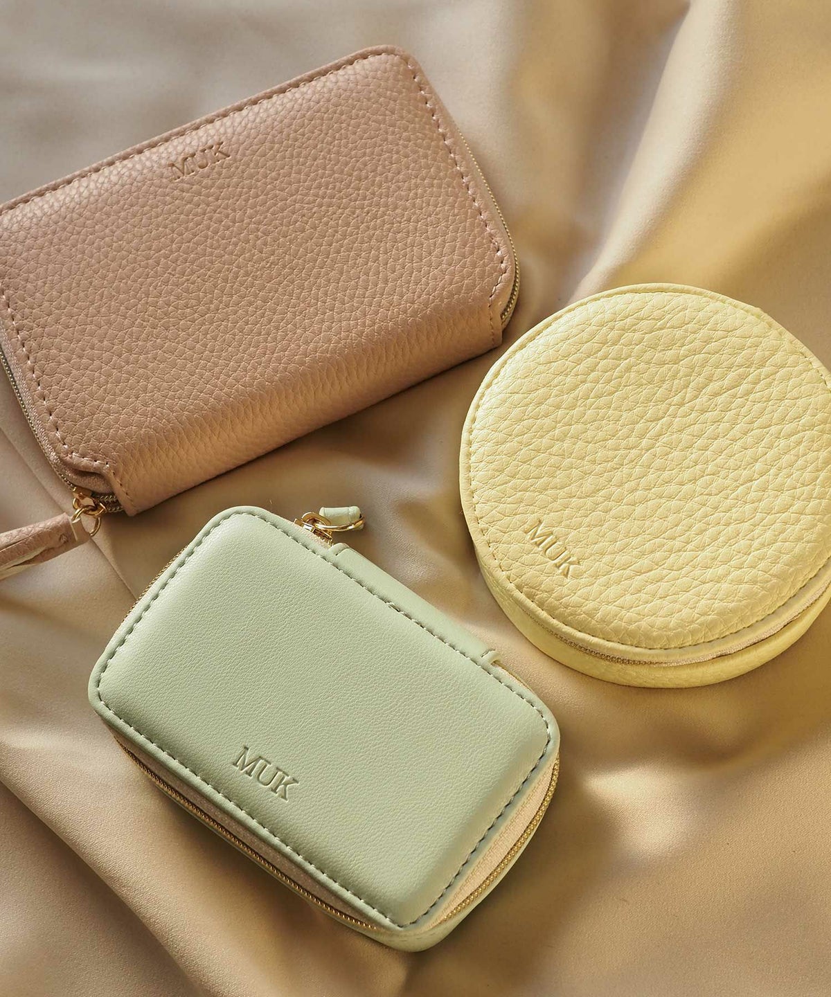 MUKアクセサリーポーチラウンド型フェイクレザータイプ