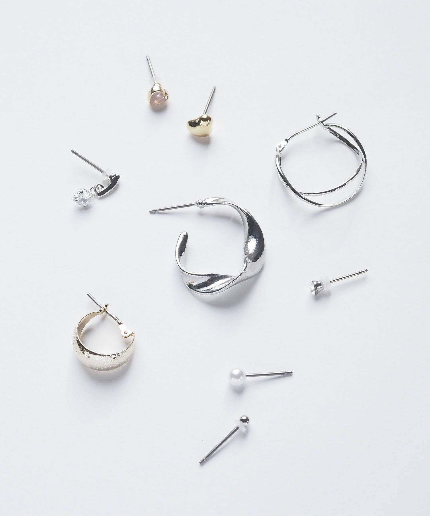 ツイストメタルピュアチタンポストピアス【ISS】