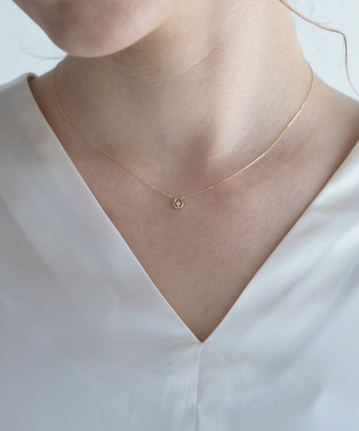 【web限定】[K10]プレシャスホースシューダイヤモンドプチペンダント