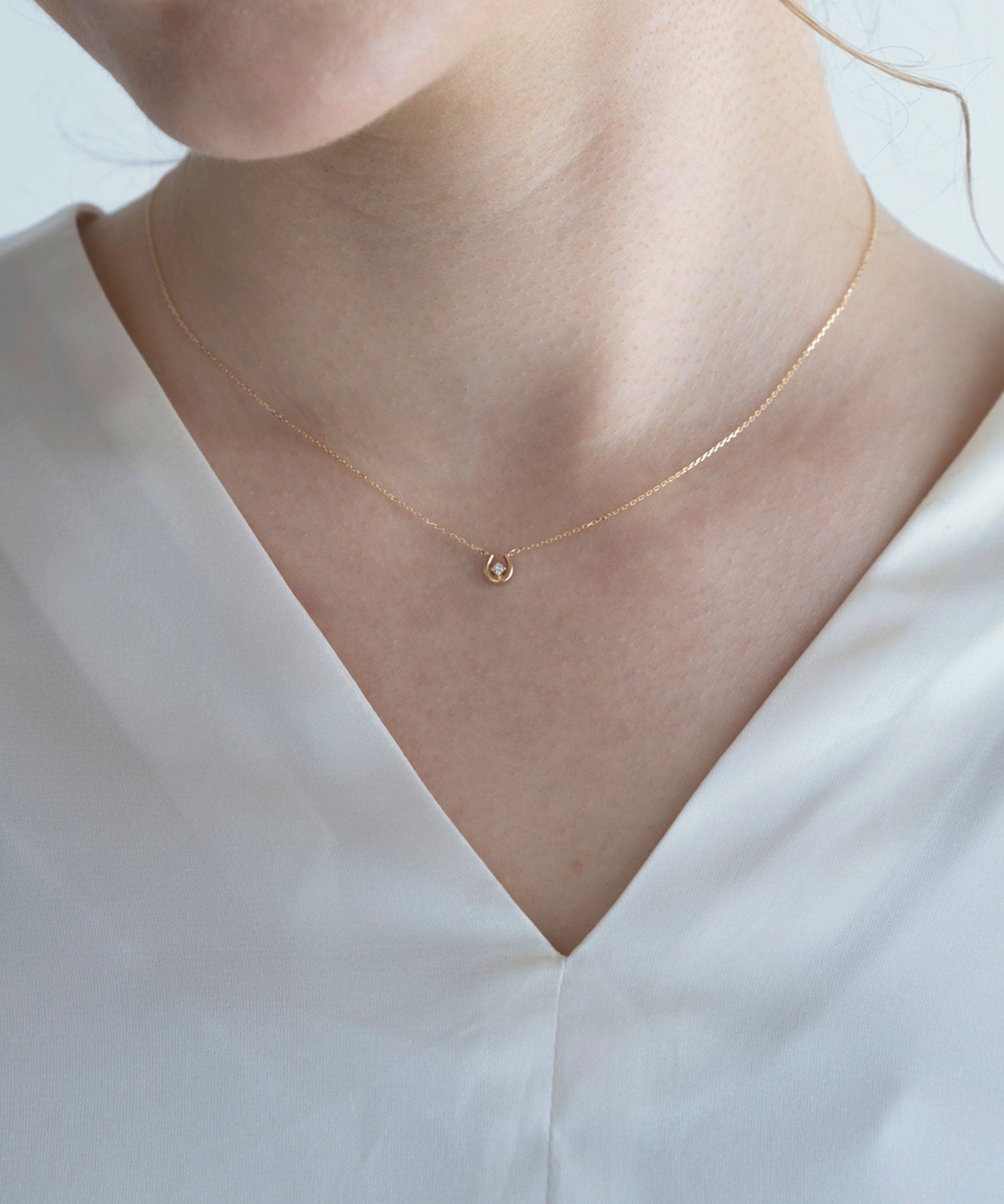 【web限定】[K10]プレシャスホースシューダイヤモンドプチペンダント