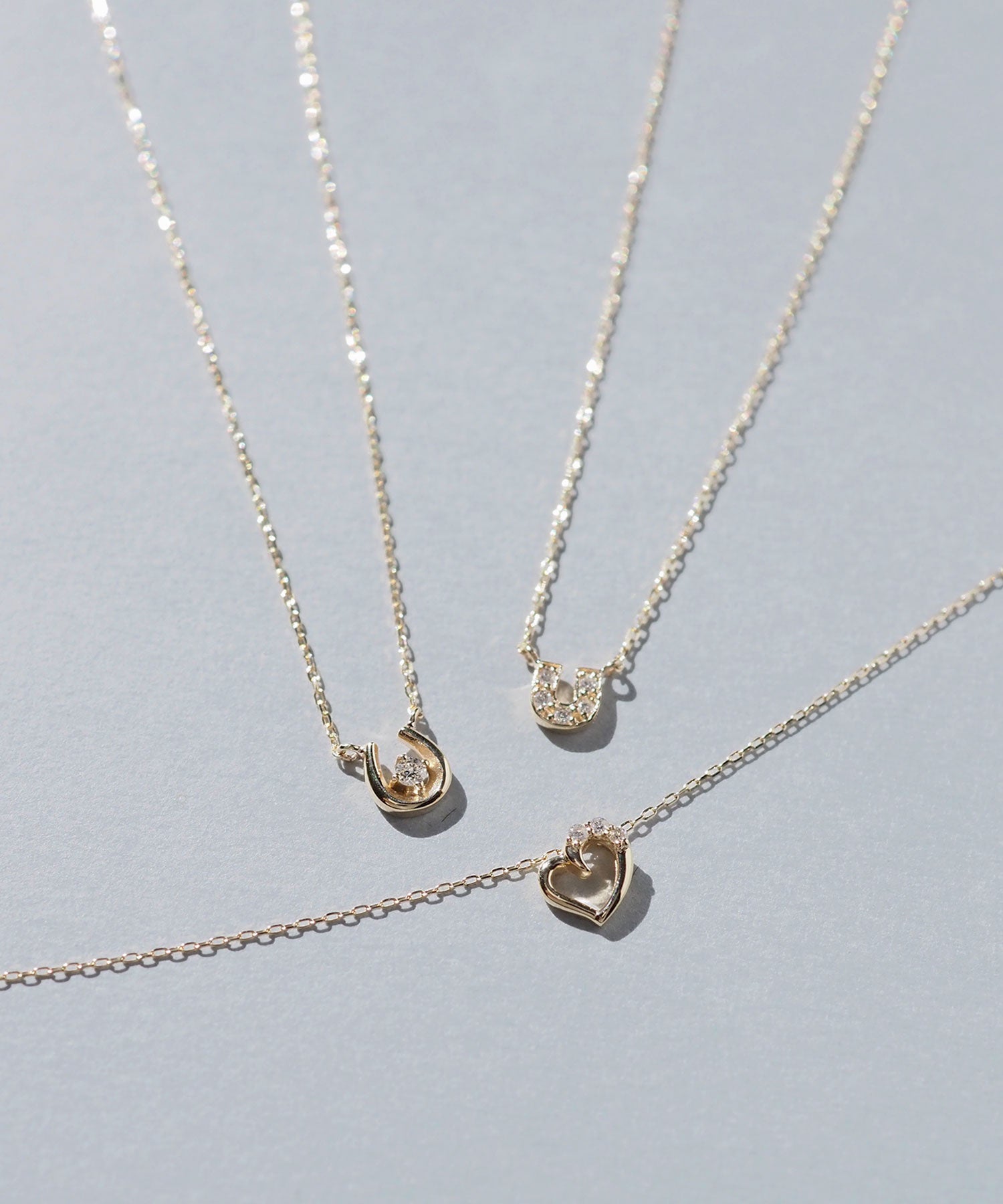 【web限定】[K10]プレシャスホースシューダイヤモンドプチペンダント