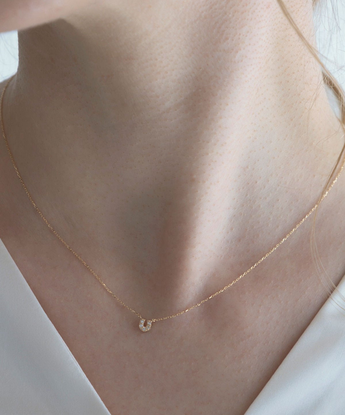 【web限定】[K10]アーバンパヴェホースシューダイヤモンドプチペンダント