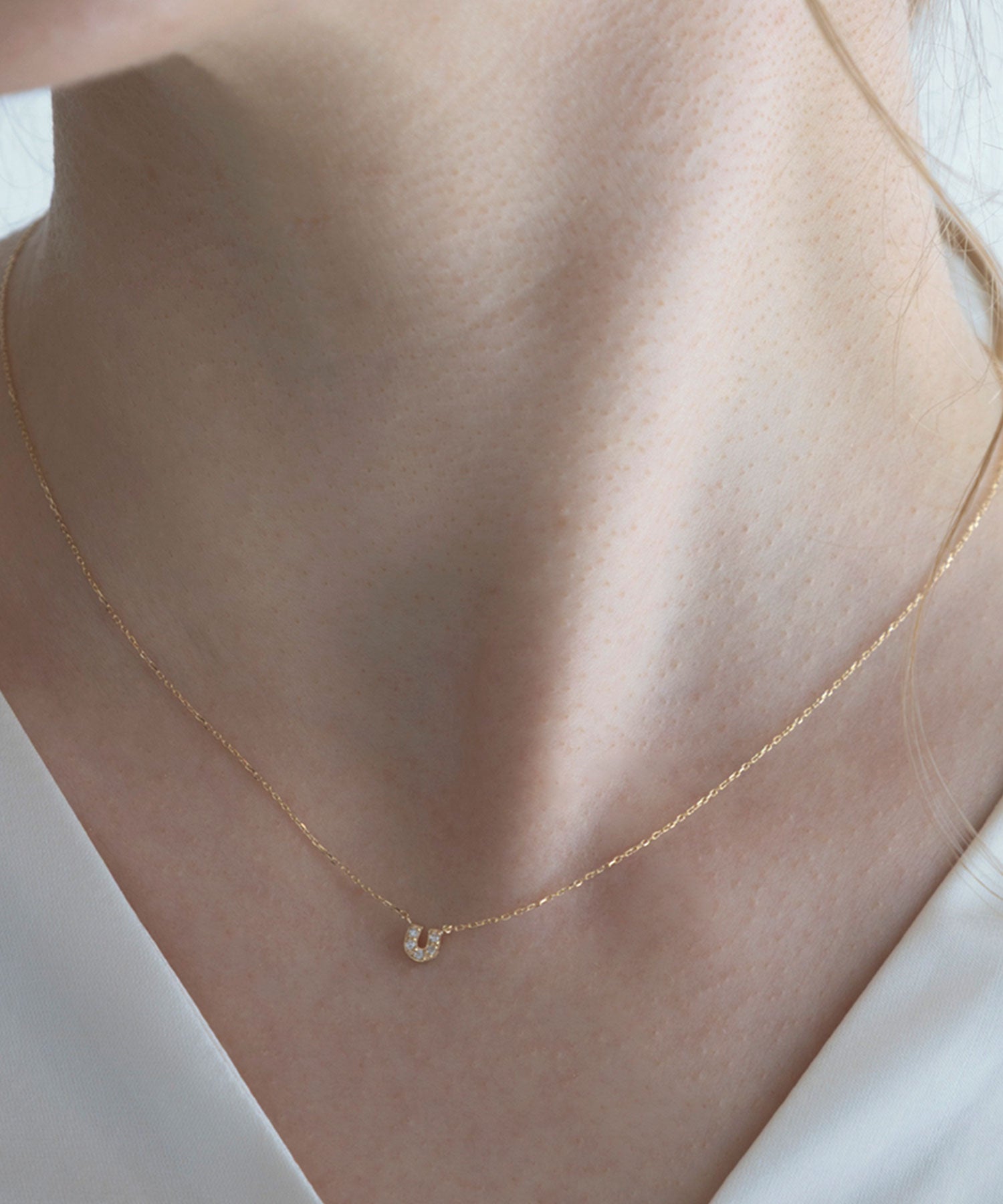 【web限定】[K10]アーバンパヴェホースシューダイヤモンドプチペンダント