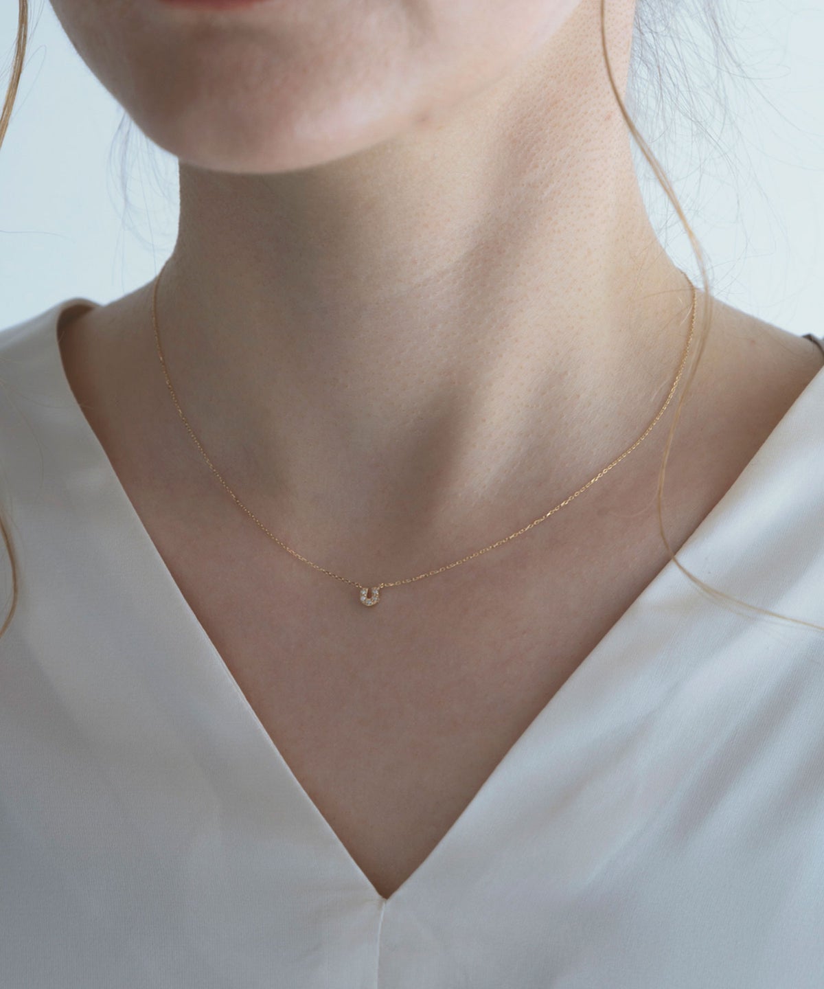 【web限定】[K10]アーバンパヴェホースシューダイヤモンドプチペンダント